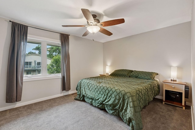 1650 107th Ave NW, Coon Rapids, MN 55433 - carpeted bedroom featuring a ceiling fan and baseboards