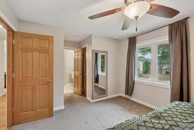 1650 107th Ave NW, Coon Rapids, MN 55433 - unfurnished bedroom featuring carpet flooring and a ceiling fan