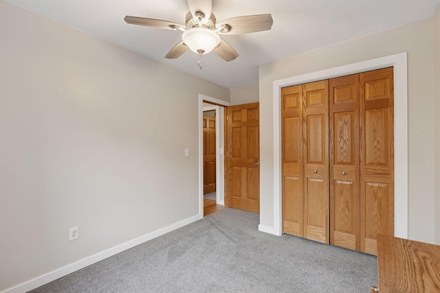 1650 107th Ave NW, Coon Rapids, MN 55433 - unfurnished bedroom with carpet floors, a closet, and a ceiling fan