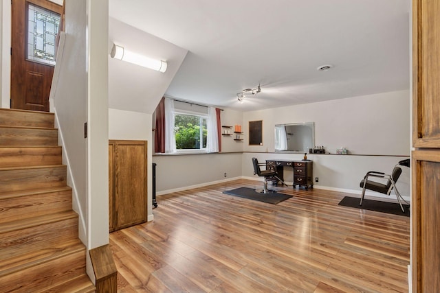 1650 107th Ave NW, Coon Rapids, MN 55433 - unfurnished office featuring baseboards and light wood finished floors