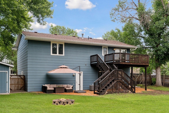 1650 107th Ave NW, Coon Rapids, MN 55433 - rear view of house with an outdoor living space with a fire pit, a wooden deck, and stairs