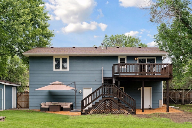 1650 107th Ave NW, Coon Rapids, MN 55433 - back of property featuring an outdoor hangout area, stairs, a wooden deck, and a storage shed