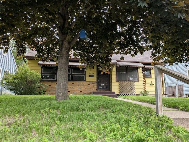 3465 5th St NE, Minneapolis, MN 55418 - view of front of home featuring roof with shingles