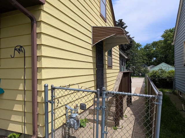 3465 5th St NE, Minneapolis, MN 55418 - view of side of home with a gate