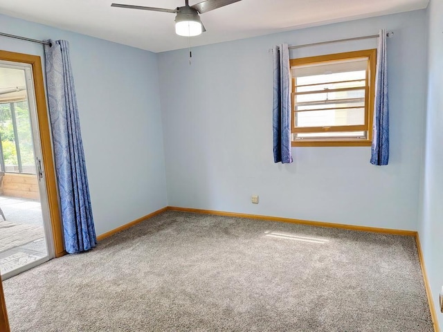 3465 5th St NE, Minneapolis, MN 55418 - spare room with carpet and a ceiling fan