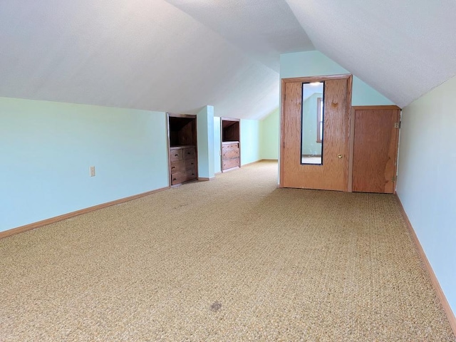 3465 5th St NE, Minneapolis, MN 55418 - additional living space featuring carpet floors and lofted ceiling