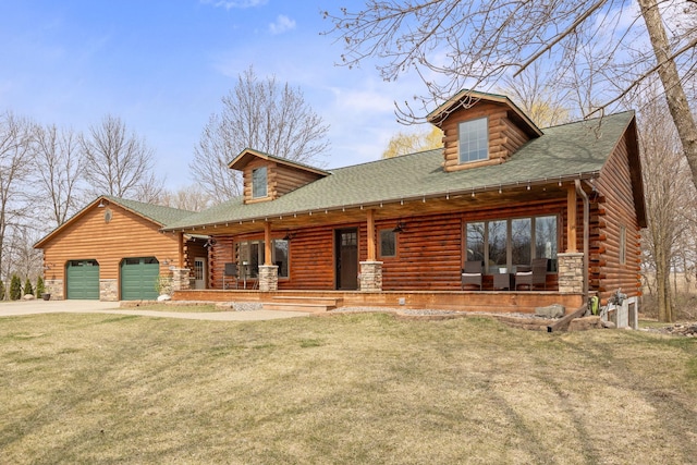 631 Pheasant Run, Winsted, MN 55395 - log-style house featuring log siding, a front lawn, concrete driveway, and roof with shingles