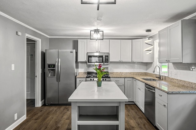 6289 Edgewood Ave N, Brooklyn Park, MN 55428 - kitchen featuring stainless steel appliances, open shelves, dark wood finished floors, tasteful backsplash, and ornamental molding