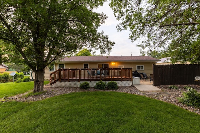 2303 9th Ave SW, Austin, MN 55912 - back of property featuring a deck