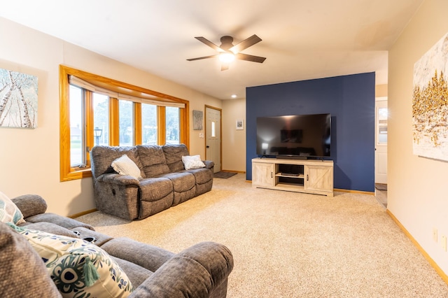 2303 9th Ave SW, Austin, MN 55912 - living area with ceiling fan and carpet floors