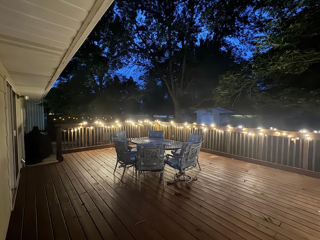 2303 9th Ave SW, Austin, MN 55912 - deck at twilight with outdoor dining area