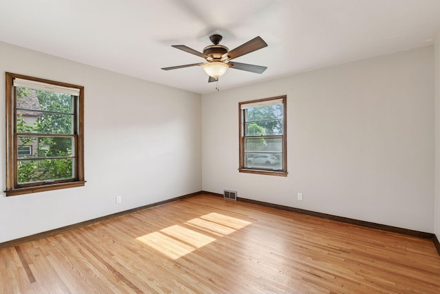 2514 5th St NE, Minneapolis, MN 55418 - empty room with light wood-style flooring and ceiling fan