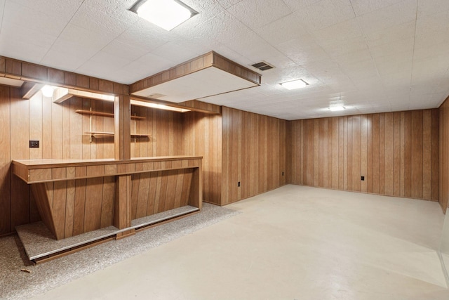 2514 5th St NE, Minneapolis, MN 55418 - indoor dry bar with wooden walls and concrete floors