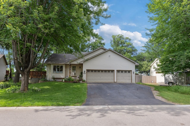 3147 94th Ln NE, Blaine, MN 55449 - ranch-style home featuring asphalt driveway and an attached garage