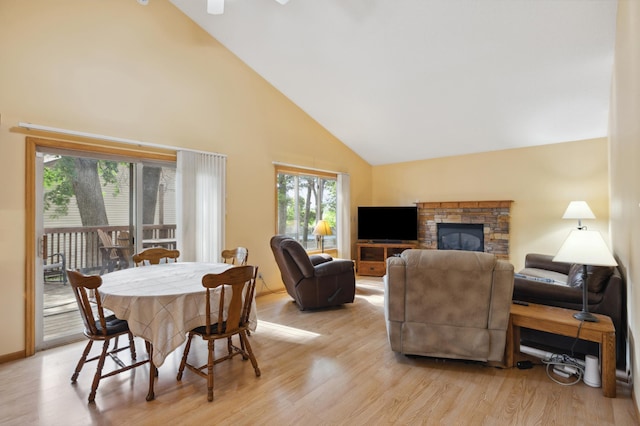 3147 94th Ln NE, Blaine, MN 55449 - dining area featuring light wood-style floors and high vaulted ceiling