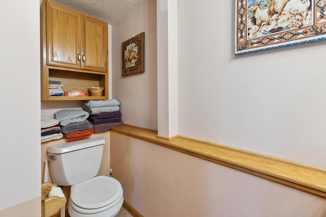3147 94th Ln NE, Blaine, MN 55449 - half bathroom with toilet and a textured ceiling