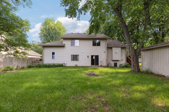3147 94th Ln NE, Blaine, MN 55449 - back of house with an outdoor fire pit