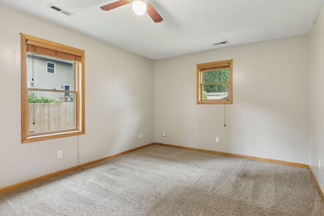 2070 Racine Ave S, Lake Saint Croix Beach, MN 55043 - carpeted empty room with ceiling fan and a textured ceiling