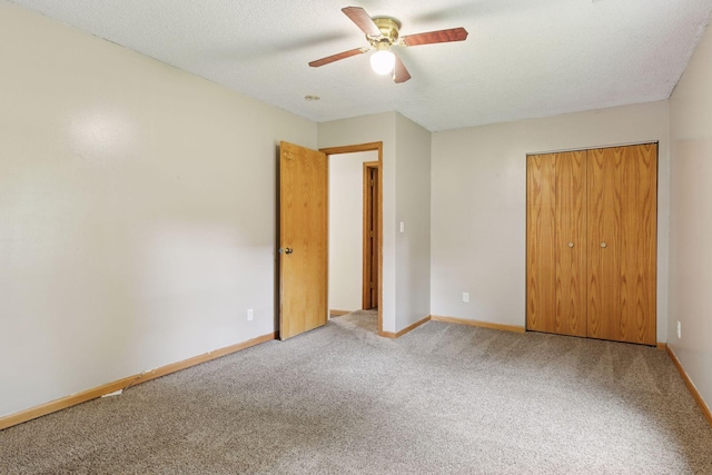 2070 Racine Ave S, Lake Saint Croix Beach, MN 55043 - unfurnished bedroom with carpet flooring, a closet, and a ceiling fan