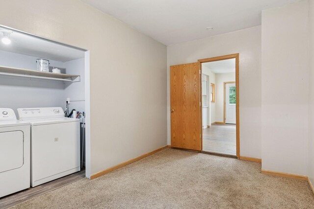 2070 Racine Ave S, Lake Saint Croix Beach, MN 55043 - washroom featuring washing machine and dryer and light carpet