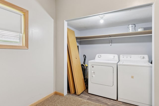 2070 Racine Ave S, Lake Saint Croix Beach, MN 55043 - washroom with washing machine and dryer and light wood-type flooring