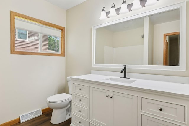 2070 Racine Ave S, Lake Saint Croix Beach, MN 55043 - full bath featuring vanity and wood finished floors