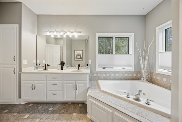26659 145th St NW, Zimmerman, MN 55398 - full bathroom with double vanity and a jetted tub