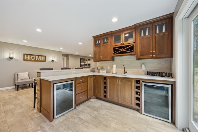 26659 145th St NW, Zimmerman, MN 55398 - indoor wet bar featuring beverage cooler, tasteful backsplash, and recessed lighting
