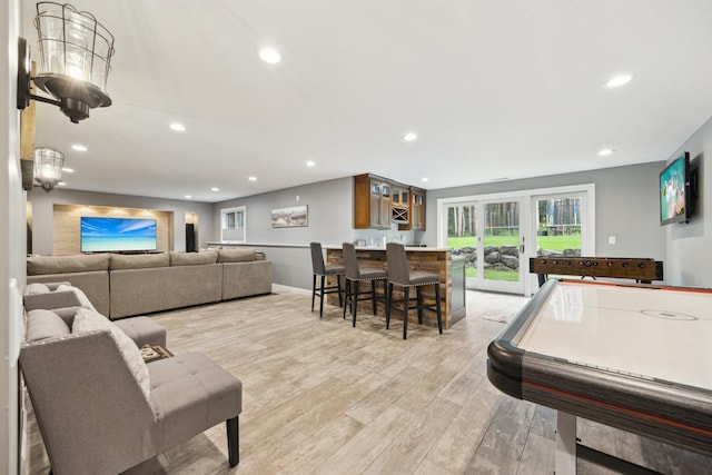 26659 145th St NW, Zimmerman, MN 55398 - rec room featuring recessed lighting, light wood-type flooring, and bar