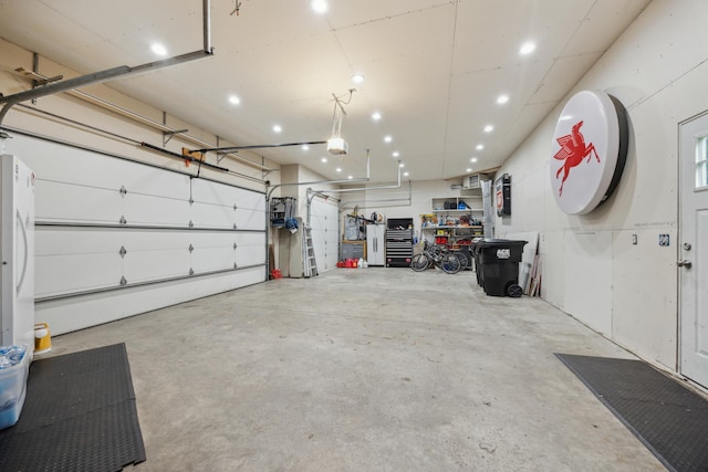 26659 145th St NW, Zimmerman, MN 55398 - garage with a garage door opener and recessed lighting