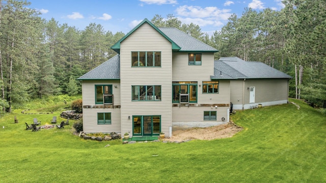 26659 145th St NW, Zimmerman, MN 55398 - back of property with a lawn and a shingled roof