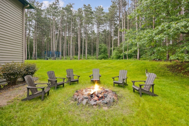 26659 145th St NW, Zimmerman, MN 55398 - view of green lawn featuring an outdoor fire pit