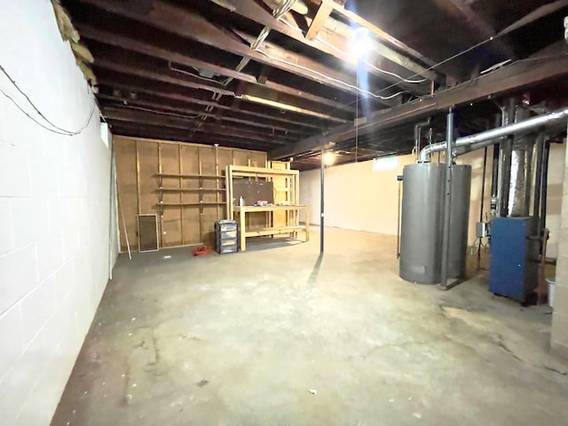 2411 Como Ave, Saint Paul, MN 55108 - unfinished below grade area featuring water heater, heating unit, and concrete block wall