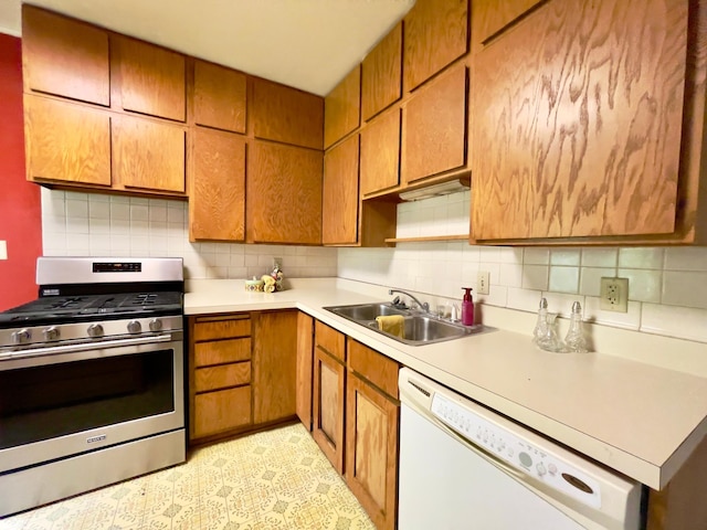 2411 Como Ave, Saint Paul, MN 55108 - kitchen featuring stainless steel gas range oven, dishwasher, light countertops, and backsplash