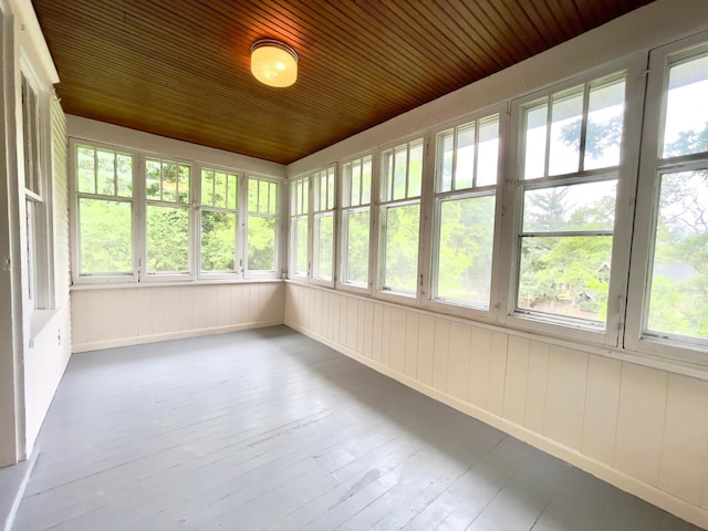 2411 Como Ave, Saint Paul, MN 55108 - unfurnished sunroom with plenty of natural light, wood-type flooring, and wooden ceiling