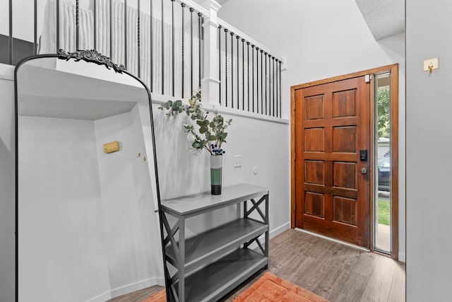 14258 Towers Ln, Eden Prairie, MN 55347 - entrance foyer with wood finished floors and baseboards