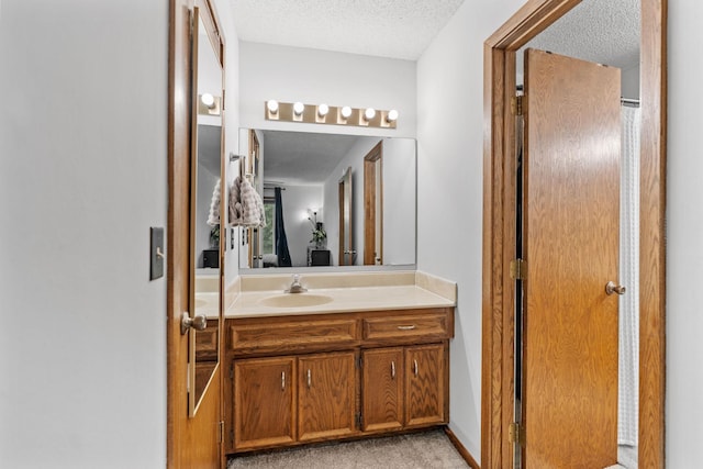 14258 Towers Ln, Eden Prairie, MN 55347 - full bathroom featuring a textured ceiling and vanity