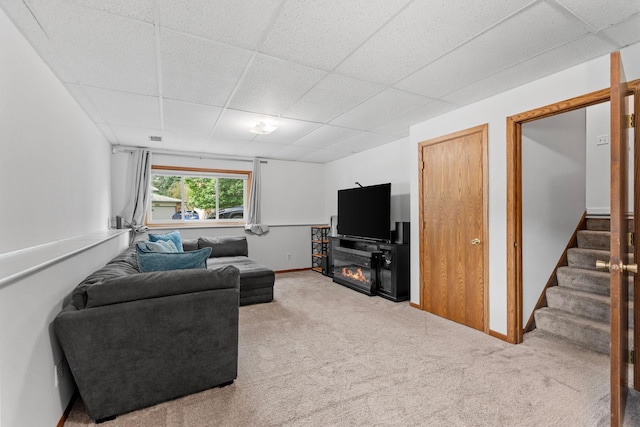 14258 Towers Ln, Eden Prairie, MN 55347 - living room with a drop ceiling, carpet, stairs, and a glass covered fireplace