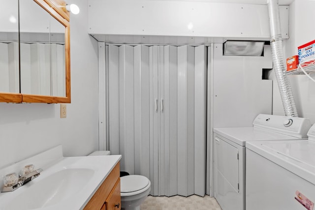 14258 Towers Ln, Eden Prairie, MN 55347 - bathroom with vanity and washing machine and dryer