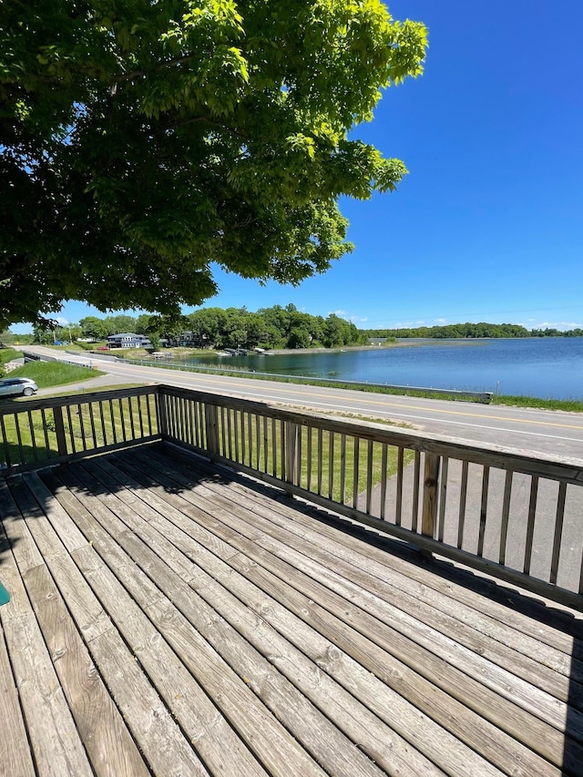 38481 County Highway 41, Star Lake Twp, MN 56528 - wooden deck with a water view