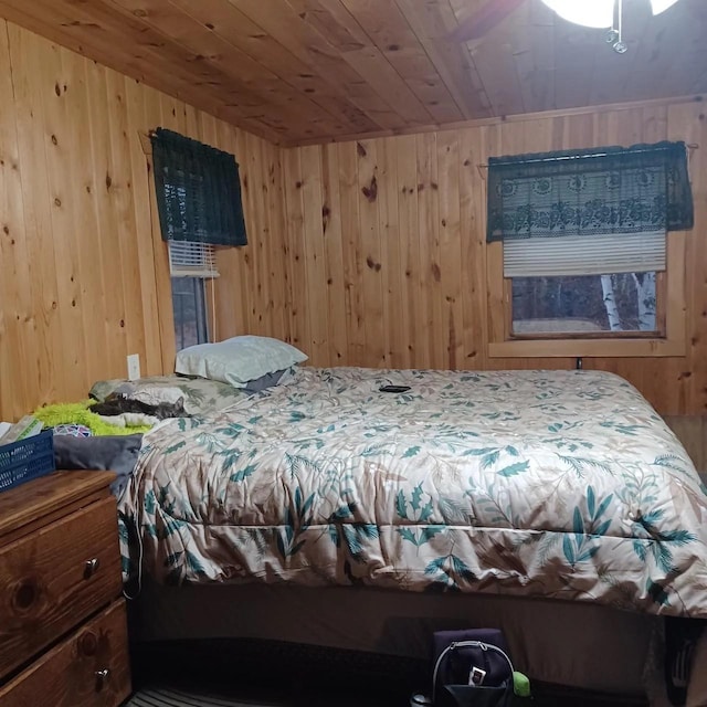 1951 Wolf Lake Dr SE, Bemidji, MN 56601 - bedroom with wooden walls and wood ceiling
