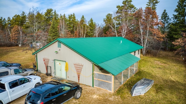 1951 Wolf Lake Dr SE, Bemidji, MN 56601 - view of pole building featuring a lawn