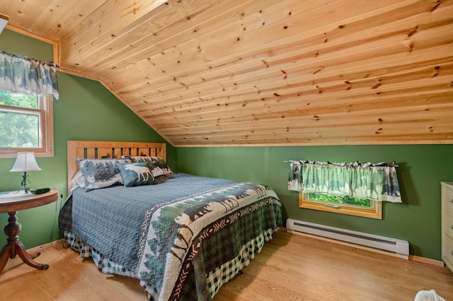 43784 Spider Lake Rd, Marcell, MN 56657 - bedroom featuring a baseboard radiator, wooden ceiling, vaulted ceiling, and wood finished floors