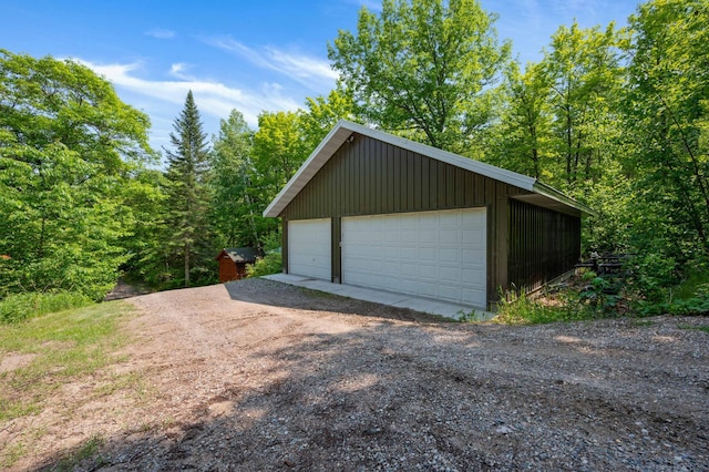 43784 Spider Lake Rd, Marcell, MN 56657 - detached garage with a wooded view