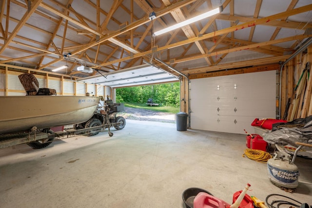 43784 Spider Lake Rd, Marcell, MN 56657 - garage with a garage door opener