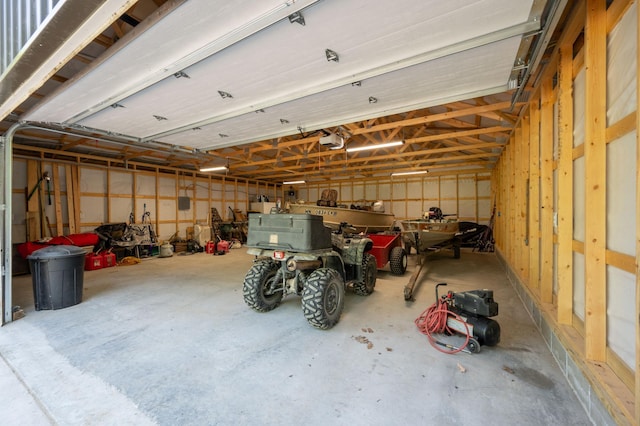 43784 Spider Lake Rd, Marcell, MN 56657 - garage featuring a garage door opener