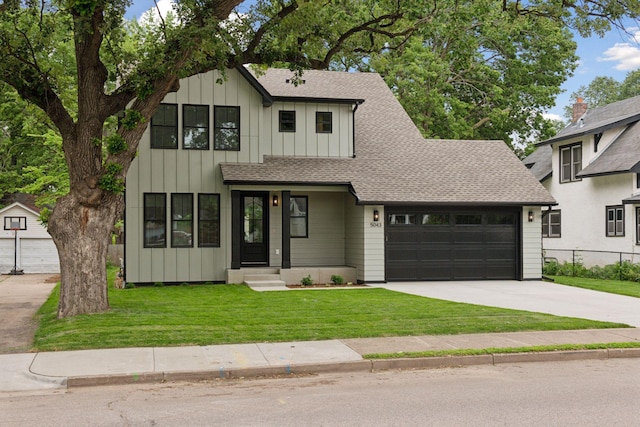 5043 42nd Ave S, Minneapolis, MN 55417 - modern farmhouse style home featuring roof with shingles, board and batten siding, a garage, concrete driveway, and an outbuilding