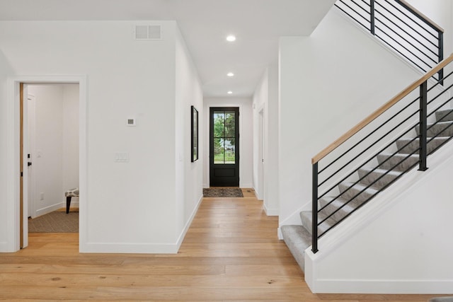 5043 42nd Ave S, Minneapolis, MN 55417 - entryway featuring stairway, light wood-style floors, and recessed lighting