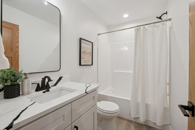 5043 42nd Ave S, Minneapolis, MN 55417 - bathroom with vanity, shower / bathtub combination with curtain, and wood finished floors