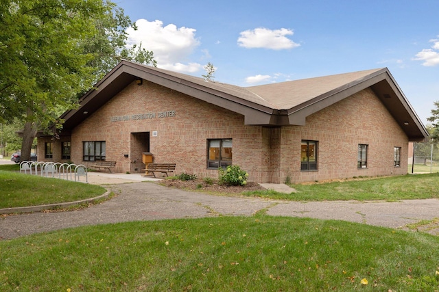 5043 42nd Ave S, Minneapolis, MN 55417 - view of side of property with brick siding and a yard